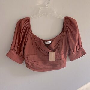 New with tags Vestaire puff sleeve bustier crop top in color rust